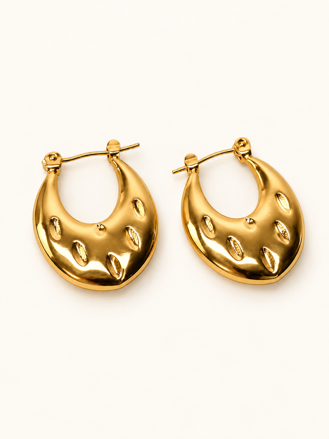 Golden Sculpted Teardrop Hoops