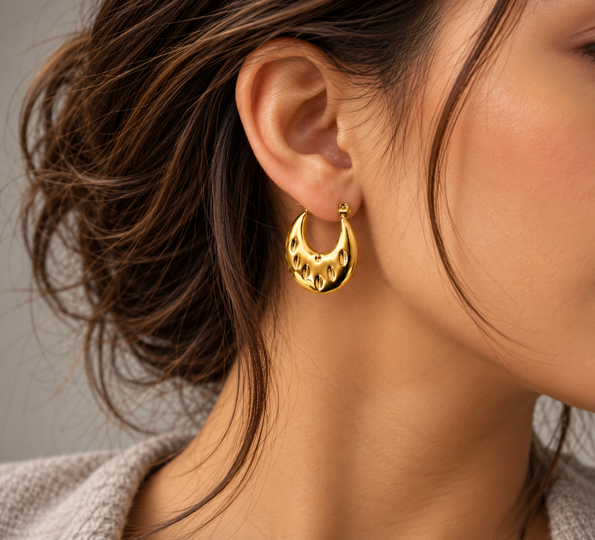 Golden Sculpted Teardrop Hoops