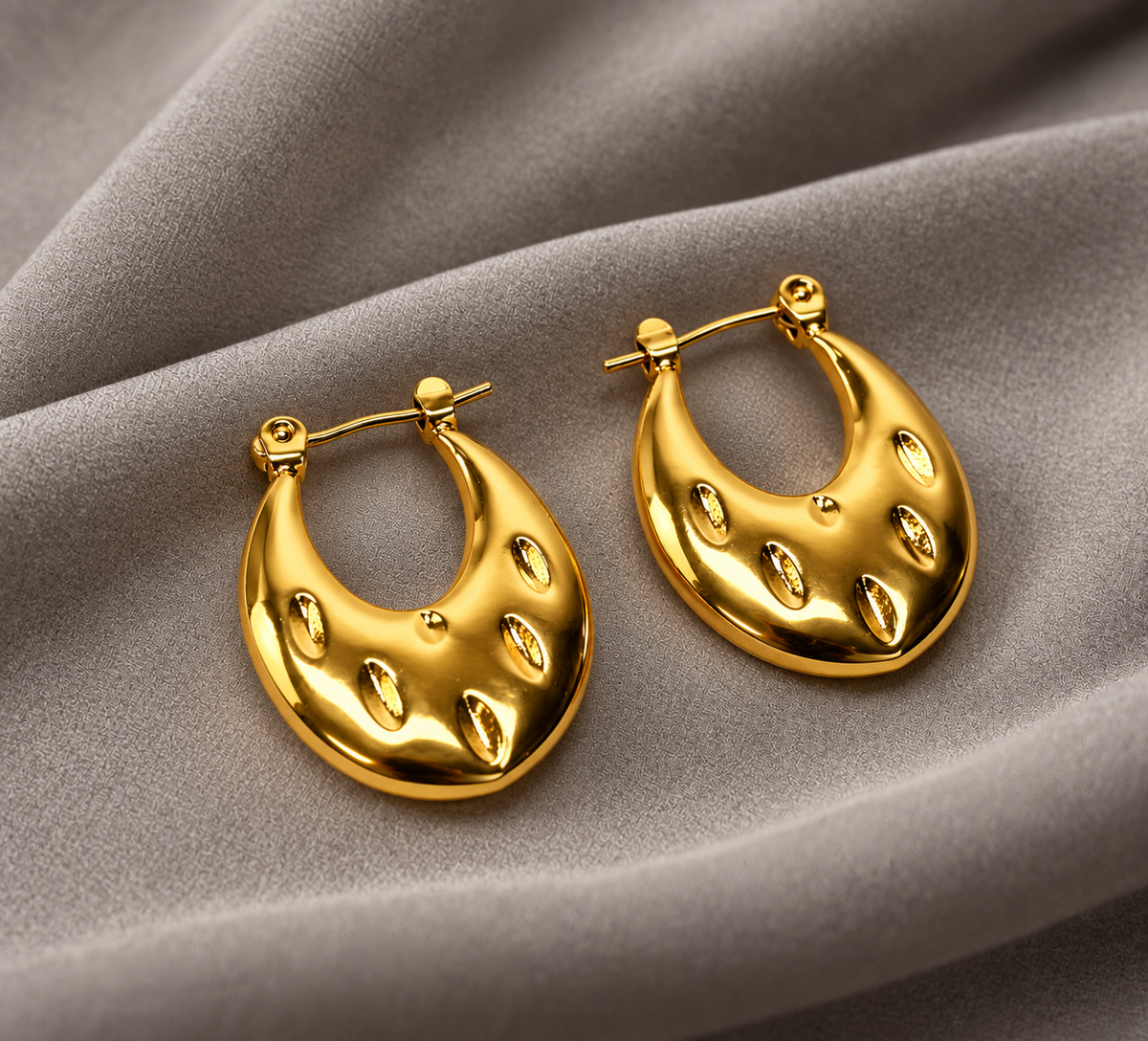 Golden Sculpted Teardrop Hoops